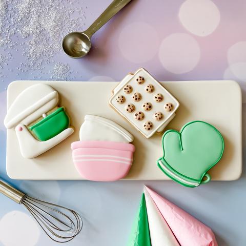Photo of frosting decorated holiday cookies