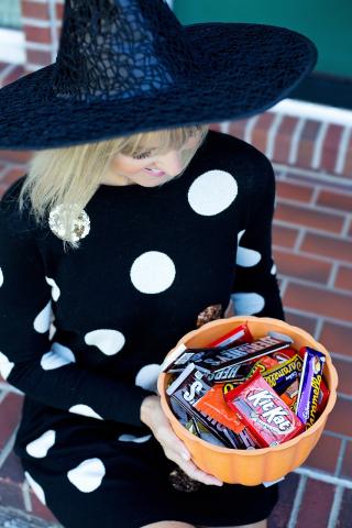 Woman wearing a witch's hat